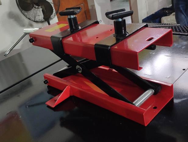 The motorcycle lifting jack that comes standard with the Performance Hoist motorcycle lift